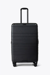 The Hybrid Check-In Roller in Black