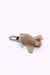 The Airplane Charm in Beige